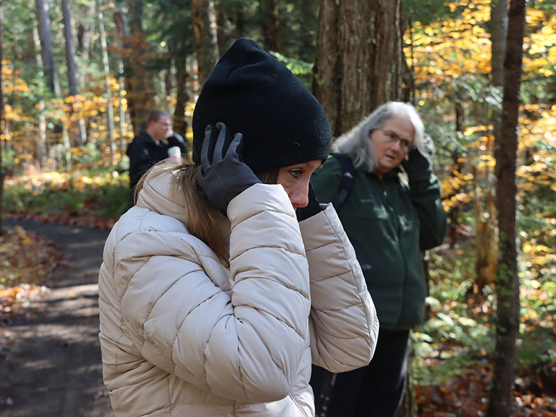 Woman with disability listening to forest